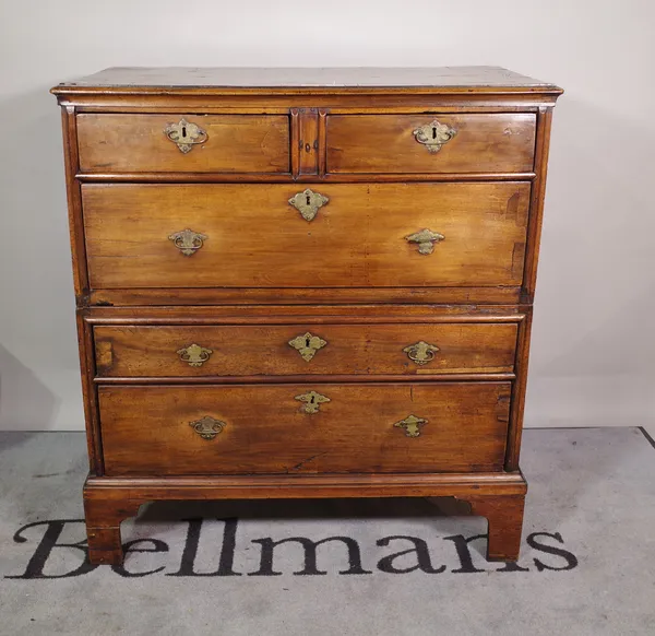 A 17th century and later walnut and fruitwood chest, the rectangular crossbanded top above two short and three long graduated drawers on later bracket