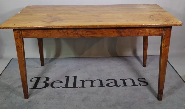 A 19th century French fruitwood dining table, with plank top and single frieze drawer, on tapering square supports, 81cm wide x 151cm long.