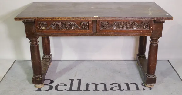 An 18th century and later continental walnut side table with pair of carved frieze drawers, on barrel turned supports, 144cm wide x 80cm high