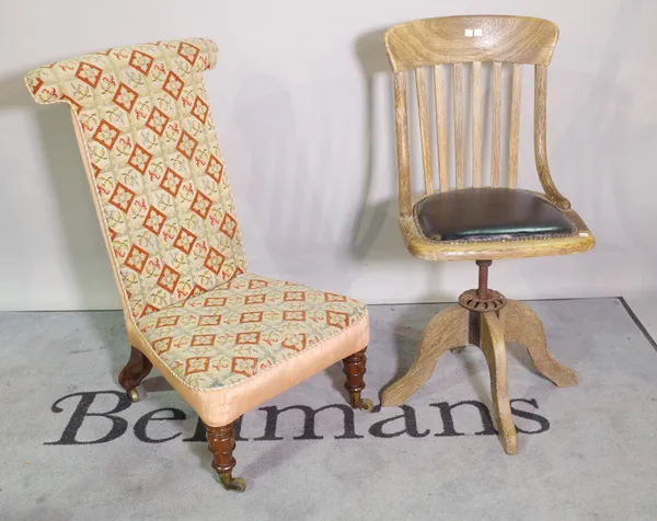 A Victorian rosewood framed prayer chair and a 20th century ash office chair, (2).