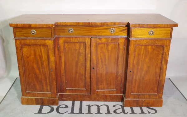 A 19th century mahogany inverted breakfront side cabinet, with three drawers over panelled cupboard doors on plinth base, 150cm wide x 89cm high.