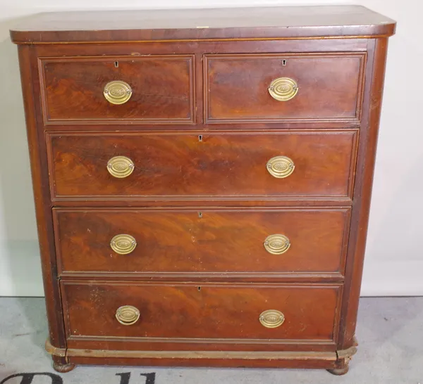 A Victorian mahogany chest of two short and three long graduated drawers, on bun base, 104cm wide x 114cm high.