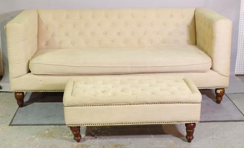 A 20th century hardwood framed two seater sofa with cream button back upholstery, 200cm wide, with matching rectangular footstool, 102cm wide x 42cm h