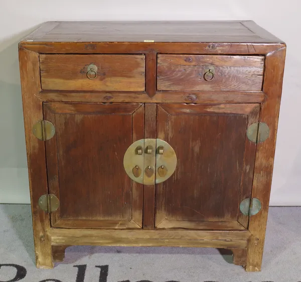 A 20th century stained pine side cabinet with two drawers, over cupboard base, 84cm wide x 85cm high.