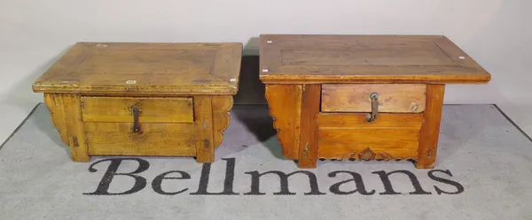 A pair of 20th century Chinese hardwood low tables with single drawers, 70cm wide x 32cm high.