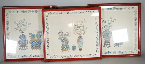 A group of three mid-20th century Chinese painted silk pictures depicting vases of flowers, each 48cm wide x 44cm high, (3).
