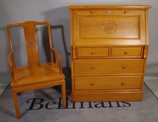 A 20th century Chinese hardwood bureau with two short and two long drawers on plinth base, 92cm wide x 116cm high and a matching hardwood open armchai