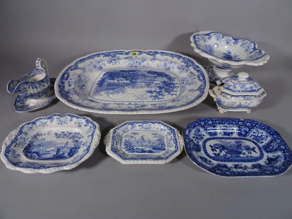 A large blue and white meat platter, 51cm wide, a pair of cornucopia wall vases, gravy boat, tureen and stand and two dishes, (qty).