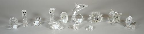 Eleven small Swarovski crystal models of animals, (11).