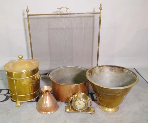 Metalware including: a mid-20th century silver plated mantel clock, a brass fire bucket of cylindrical form and two large copper bowls, a jug and a fi