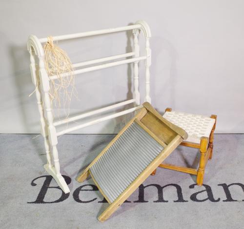 A group of decorative interior items, comprising; a pale grey painted three tier wooden towel rail, a traditional pine and zinc ribbed washboard and a
