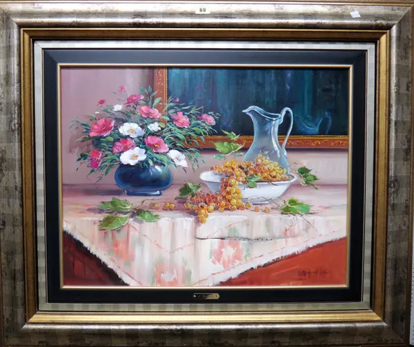 J** Gonzales (20th century), Tabletop still life of grapes and flowers, oil on canvas, signed, 49cm x 64cm.