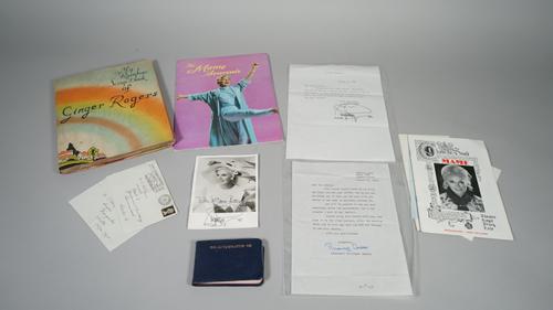 GINGER ROGERS:  a miscellany including a scrapbook of cuttings, 40pp.: a photograph, a 6 line ALS., and autograph book;   'Mame', Theatre Royal, Drury