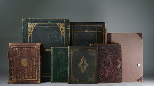 MISCELLANY OF ALBUMS - a group of seven albums including old prints, Woodbury type and other photos. etc., together with a few loose prints. (7)