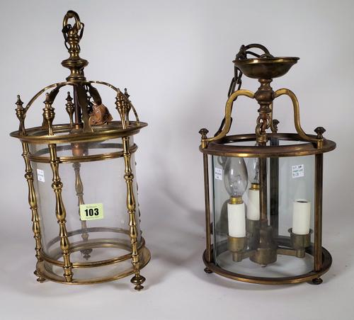A Victorian style gilt brass hall lantern of circular form with pillar supports and single light fitment, 40cm high and another similar gilt metal hal