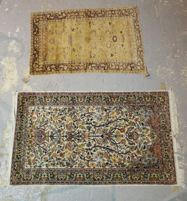 An Indian Tree of Life rug, 162cm x 95cm, and a Turkish rug with flower filled vase, 127cm x 82cm.