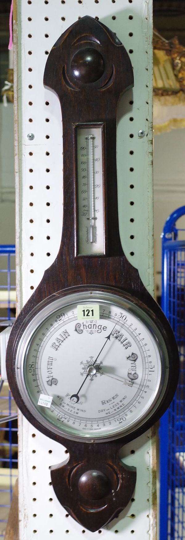 A 20th century oak wall barometer, 79cm high.