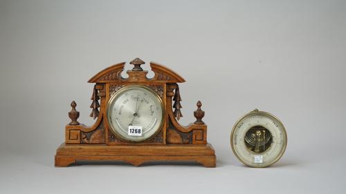 A barometer/thermometer compendium by J.B. Dancer, Manchester, the 5 inch drum housed in a carved oak case and another brass drum cased barometer, by