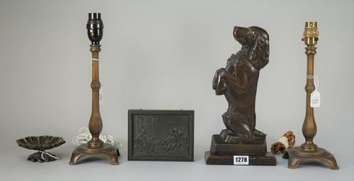 Bennett Ingram; a patinated bronze flatback door stop, cast as a begging spaniel, signed to the cast, on an ebonised wooden plinth, bronze 27.5cm high