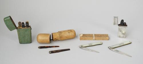 A shagreen lancet case, 18th century, enclosing four tortoiseshell lancets, 8cm high, two mother-of-pearl and silver folding fruit knives, one hallmar