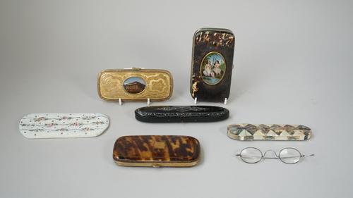 A French tortoiseshell purse, 19th century, with later painted oval picture to the lid depicting two nude bathing female figures, 14.5cm, a blonde tor
