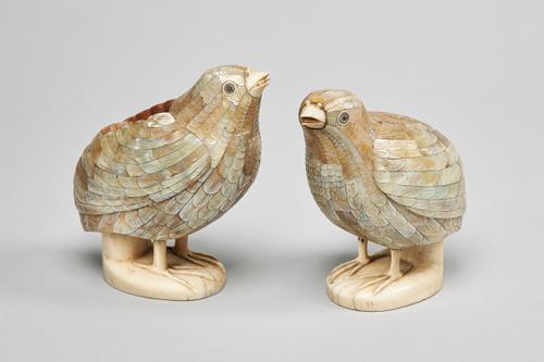 A pair of 19th century Chinese mother-of-pearl veneered and ivory standing quail box and covers, one back with a small disguised cover inscribed "Qian