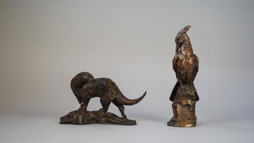 Hamish Mackie, British b.1973, bronze model of an otter holding a fish in its mouth, signed to the cast, dated 2013 Ltd edition 5/25, 22.5cm wide and