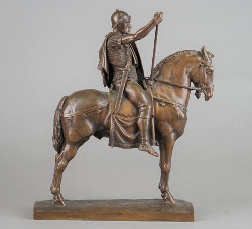 After Emamanuel Fremiet (1824-1910), a French patinated bronze equestrian figure group 'Chef Caulois', signed E FREMIET to the cast and stamped F Barb