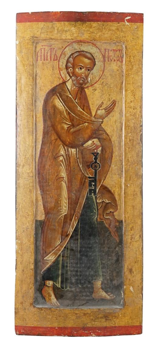A 19th century Russian Icon depicting a saintly figure, possibly Saint Peter, holding a key against a gilt ground 80cm x 32cm. Illustrated. £20