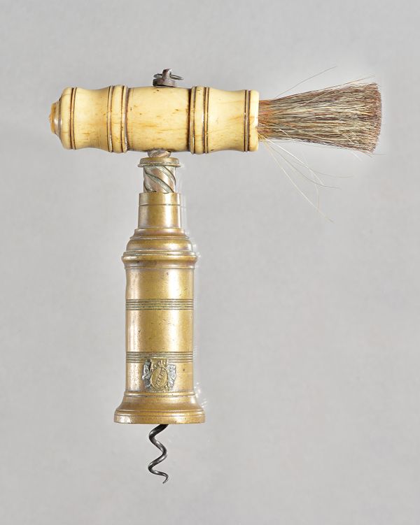 A mid 19th century Thomason type brass barrel corkscrew, with turned bone handle and brush, badge marked 'Patent'. Illustrated.