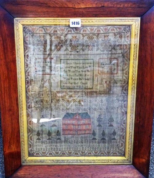 An 18th century sampler by Mary Salmon (?), depicting a house surrounded by trees, with moral verse and a wide foliate border in a rosewood frame, 44c