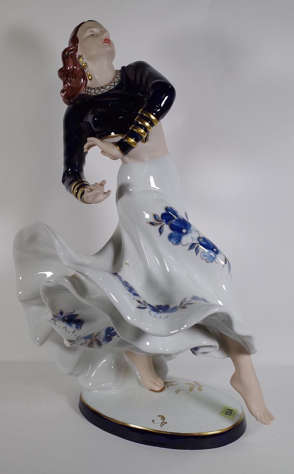 A 20th century Czechoslovakian ceramic figure of a dancing lady, 60cm high.