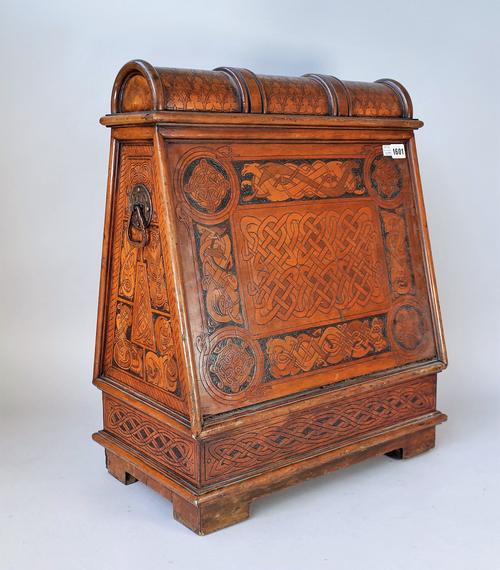 An unusual 19th century walnut box of tapering form, the fall front over single drawer, the whole decorated with Art Nouveau motif, 48cm wide x 60cm h