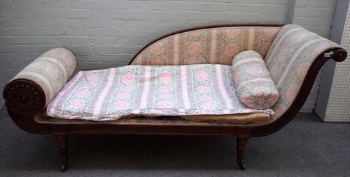 An early Victorian mahogany double scroll end chaise lounge, on turned supports, 200cm wide x 85cm high.