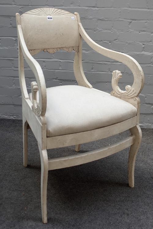 A 19th century and later white painted Swedish open armchair on sabre supports, 53cm wide x 90cm high.