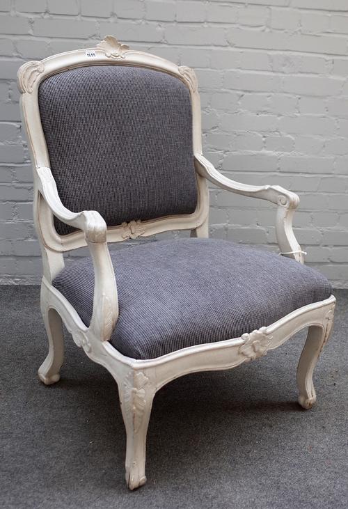 A Louis XV style grey painted open armchair on scroll supports, 70cm wide x 100cm high.