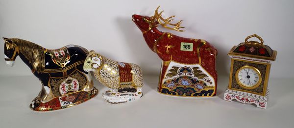 Four Royal Crown Derby Imari paperweights, including a stag, a mantel clock, a horse and a ram, (4). S3B CAB