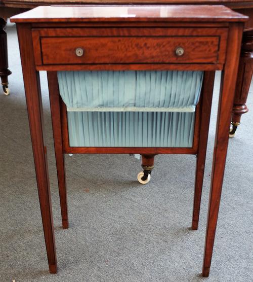 A George III satinwood work table with integral fire screen back and single frieze drawer, on tapering square supports, 50cm wide x 73cm high.