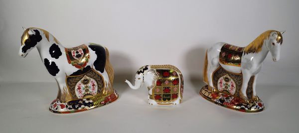 Three Royal Crown Derby Imari paperweights, including two horses and one elephant, (3). CAB