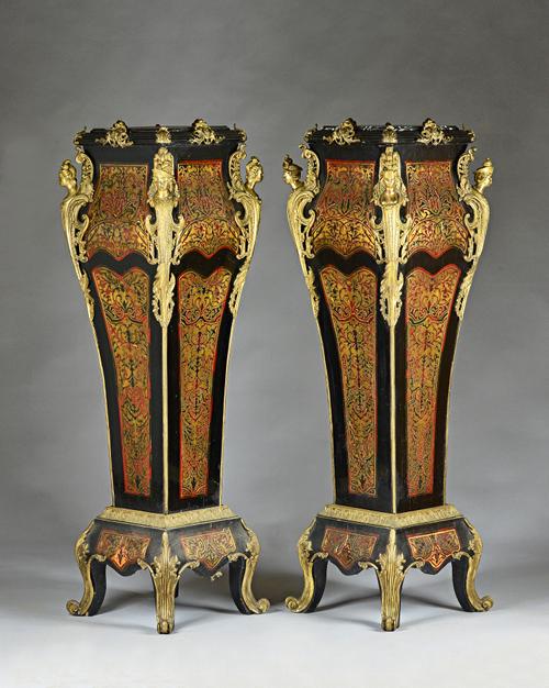 A large pair of gilt metal mounted boulle work pedestals, each with marble tops and figured bust mounts on scroll feet, 50cm wide x 152cm high, (2).
