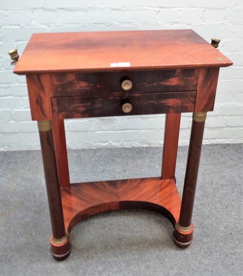 An Empire Revival gilt metal mounted mahogany work table with fitted interior over single drawer on turned supports, 61cm wide x 80cm high.