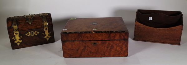 A Victorian walnut and brass bound domed box, 23cm wide x 17cm high, a Victorian burr walnut and mother-of-pearl inlaid writing slope, 30cm wide x 13c