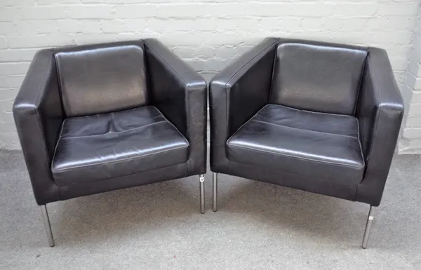 A pair of 20th century chrome and leather square back armchairs on turned supports, 77cm wide x 71cm high.
