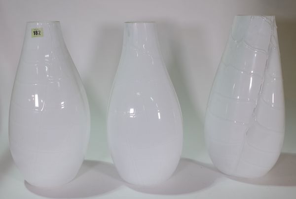 A set of three Murano opaque vases with moulded faux alligator pattern, 45cm high.