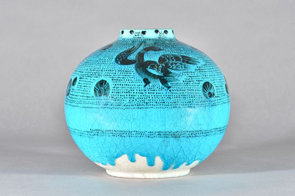 A craquelure earthenware vase, Gustov Heinkel for Karlsruthe, C.1937-1940, stylised birds against a blue ground, marks to base, 22cm high. Illustrated