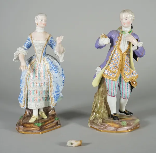 A pair of Meissen figures of a gallant and companion, late 19th century, each modelled standing in fashionable 18th century costume, blue crossed swor