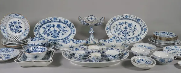 A composite group of Meissen blue and white porcelain, late 19th/20th century, each piece decorated with the `Onion' pattern, comprising; a pierced co