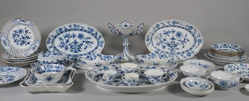 A composite group of Meissen blue and white porcelain, late 19th/20th century, each piece decorated with the `Onion' pattern, comprising; a pierced co