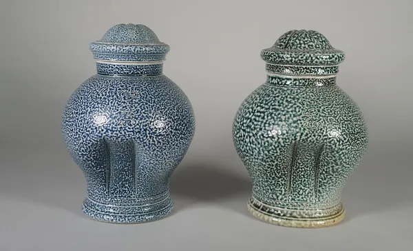 Two studio pottery salt glaze stoneware  vases and covers by Steve Harrison, dated 2000, each of similar baluster form with an indentation to one side