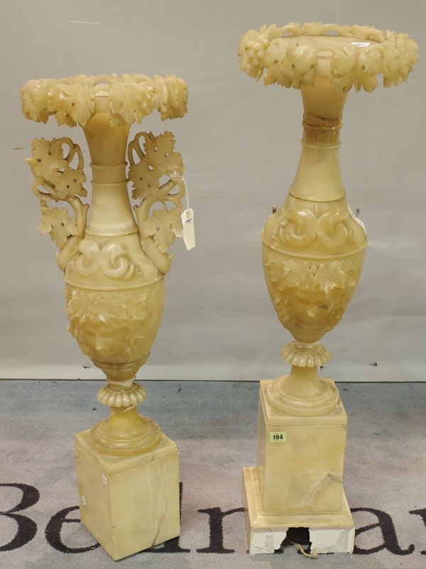 A pair of neoclassical alabaster vases, (a.f.), 97cm high, (2).  5443